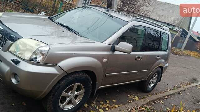 Серый Ниссан ИксТрейл, объемом двигателя 2.2 л и пробегом 230 тыс. км за 3300 $, фото 10 на Automoto.ua