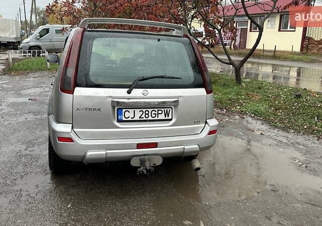 Серый Ниссан ИксТрейл, объемом двигателя 2.2 л и пробегом 391 тыс. км за 5000 $, фото 2 на Automoto.ua