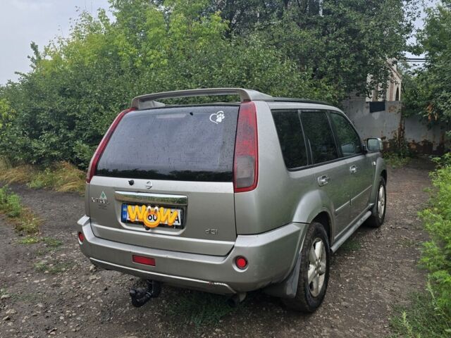 Сірий Ніссан ІксТрейл, об'ємом двигуна 0 л та пробігом 255 тис. км за 4505 $, фото 2 на Automoto.ua