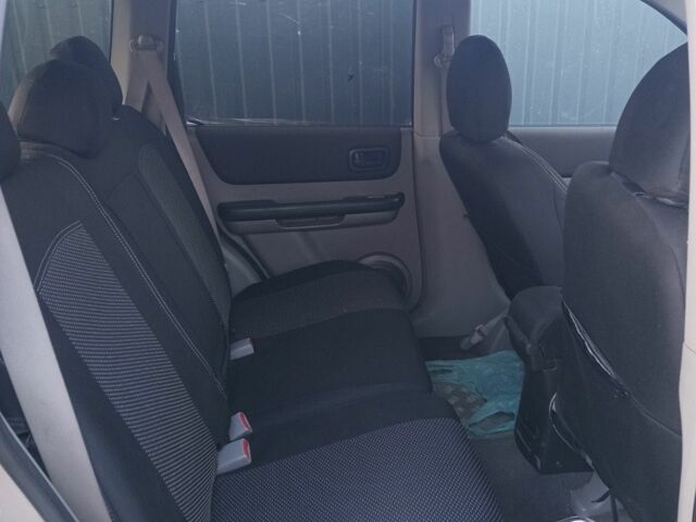 Серый Ниссан ИксТрейл, объемом двигателя 2.2 л и пробегом 340 тыс. км за 6000 $, фото 3 на Automoto.ua