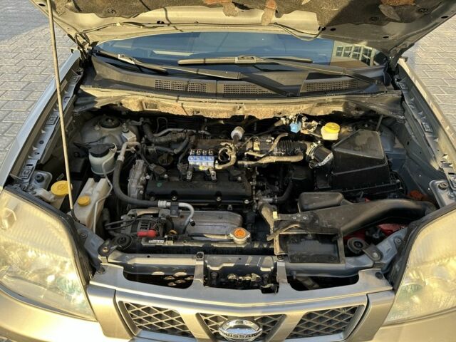 Серый Ниссан ИксТрейл, объемом двигателя 2 л и пробегом 160 тыс. км за 7000 $, фото 6 на Automoto.ua