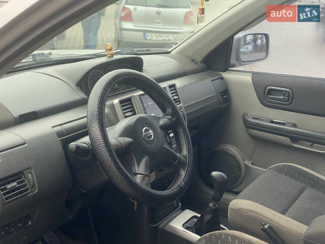 Серый Ниссан ИксТрейл, объемом двигателя 2 л и пробегом 246 тыс. км за 4499 $, фото 18 на Automoto.ua