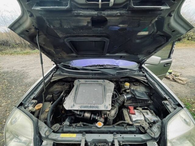 Серый Ниссан ИксТрейл, объемом двигателя 2.2 л и пробегом 298 тыс. км за 3300 $, фото 12 на Automoto.ua