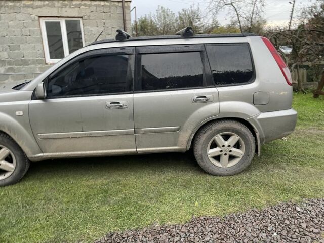 Серый Ниссан ИксТрейл, объемом двигателя 2.5 л и пробегом 299 тыс. км за 4600 $, фото 2 на Automoto.ua