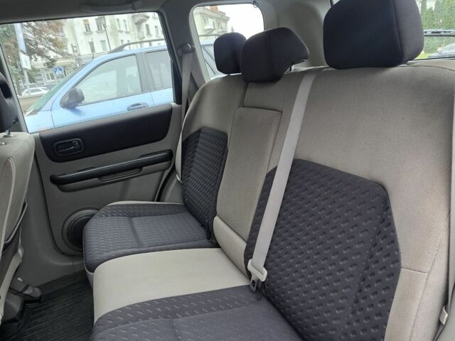 Серый Ниссан ИксТрейл, объемом двигателя 2.2 л и пробегом 260 тыс. км за 4199 $, фото 16 на Automoto.ua