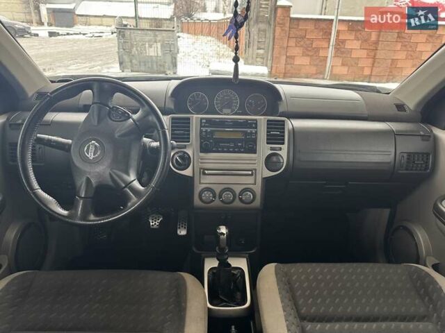 Сірий Ніссан ІксТрейл, об'ємом двигуна 2.18 л та пробігом 247 тис. км за 6800 $, фото 11 на Automoto.ua