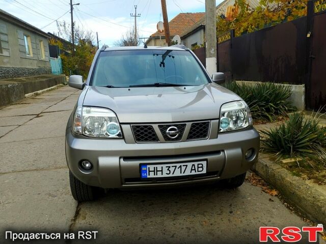 Серый Ниссан ИксТрейл, объемом двигателя 2.2 л и пробегом 240 тыс. км за 6700 $, фото 1 на Automoto.ua