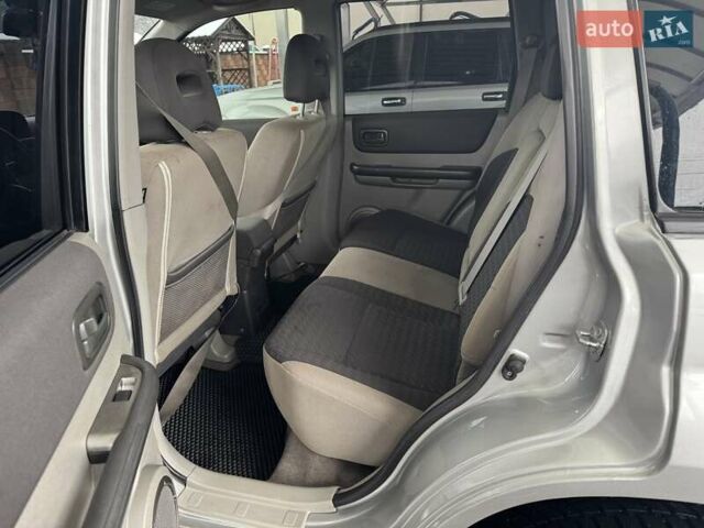 Сірий Ніссан ІксТрейл, об'ємом двигуна 2.18 л та пробігом 247 тис. км за 6800 $, фото 10 на Automoto.ua