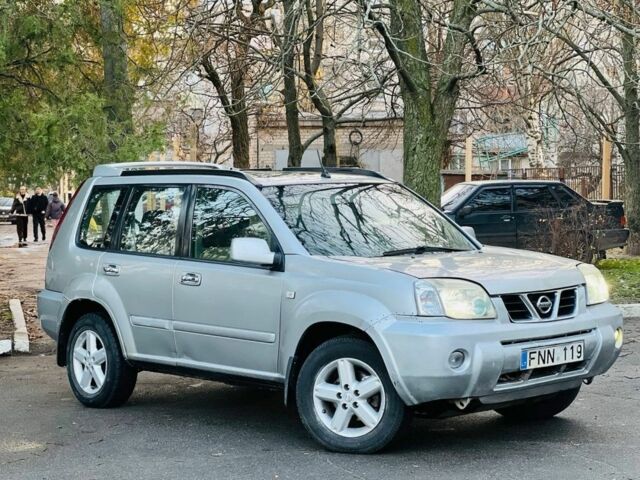 Серый Ниссан ИксТрейл, объемом двигателя 2.2 л и пробегом 100 тыс. км за 3450 $, фото 2 на Automoto.ua