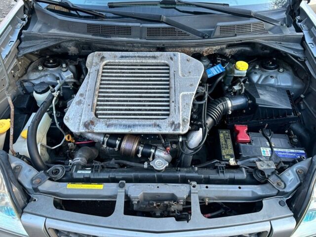 Серый Ниссан ИксТрейл, объемом двигателя 2.2 л и пробегом 319 тыс. км за 4000 $, фото 5 на Automoto.ua