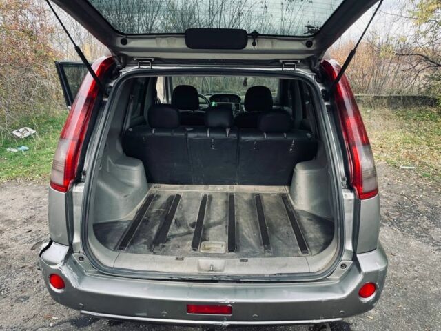 Серый Ниссан ИксТрейл, объемом двигателя 2.2 л и пробегом 298 тыс. км за 3300 $, фото 10 на Automoto.ua