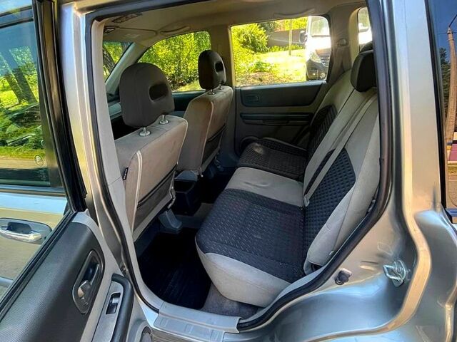 Серый Ниссан ИксТрейл, объемом двигателя 2.2 л и пробегом 170 тыс. км за 6200 $, фото 4 на Automoto.ua