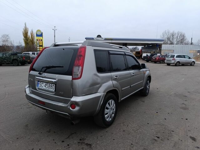 Серый Ниссан ИксТрейл, объемом двигателя 2.2 л и пробегом 333 тыс. км за 2500 $, фото 7 на Automoto.ua