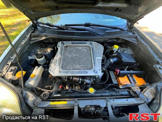 Серый Ниссан ИксТрейл, объемом двигателя 2.2 л и пробегом 170 тыс. км за 6200 $, фото 6 на Automoto.ua