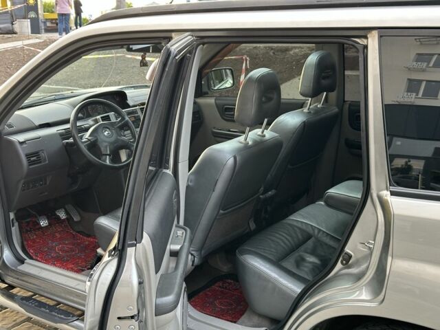 Серый Ниссан ИксТрейл, объемом двигателя 2 л и пробегом 160 тыс. км за 7000 $, фото 11 на Automoto.ua