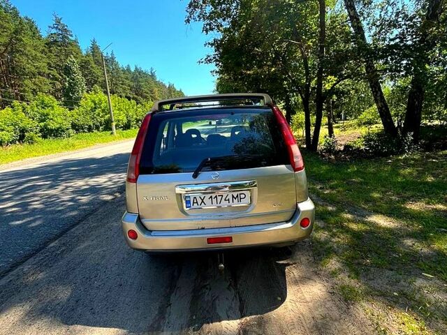 Серый Ниссан ИксТрейл, объемом двигателя 2.2 л и пробегом 170 тыс. км за 6200 $, фото 2 на Automoto.ua