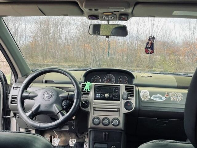 Серый Ниссан ИксТрейл, объемом двигателя 2.2 л и пробегом 298 тыс. км за 3300 $, фото 9 на Automoto.ua