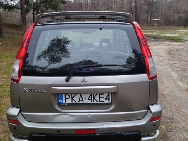 Серый Ниссан ИксТрейл, объемом двигателя 0 л и пробегом 245 тыс. км за 2900 $, фото 5 на Automoto.ua