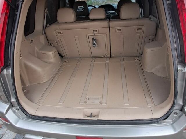 Серый Ниссан ИксТрейл, объемом двигателя 2 л и пробегом 290 тыс. км за 4950 $, фото 5 на Automoto.ua