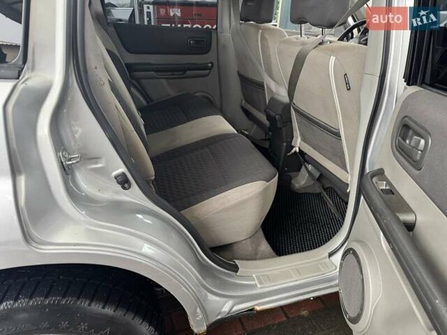 Сірий Ніссан ІксТрейл, об'ємом двигуна 2.18 л та пробігом 247 тис. км за 6800 $, фото 6 на Automoto.ua