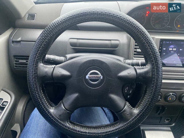 Серый Ниссан ИксТрейл, объемом двигателя 2 л и пробегом 246 тыс. км за 4499 $, фото 21 на Automoto.ua