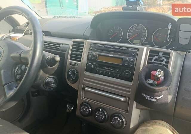 Серый Ниссан ИксТрейл, объемом двигателя 2.2 л и пробегом 230 тыс. км за 3300 $, фото 11 на Automoto.ua