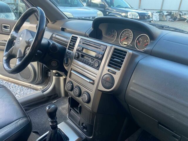 Сірий Ніссан ІксТрейл, об'ємом двигуна 2.2 л та пробігом 220 тис. км за 4100 $, фото 7 на Automoto.ua