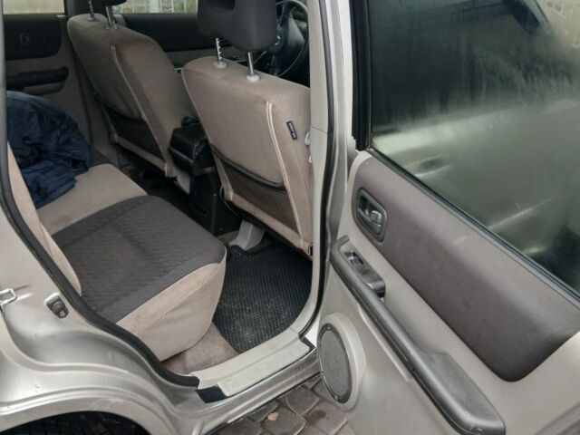 Серый Ниссан ИксТрейл, объемом двигателя 2.2 л и пробегом 302 тыс. км за 5199 $, фото 5 на Automoto.ua