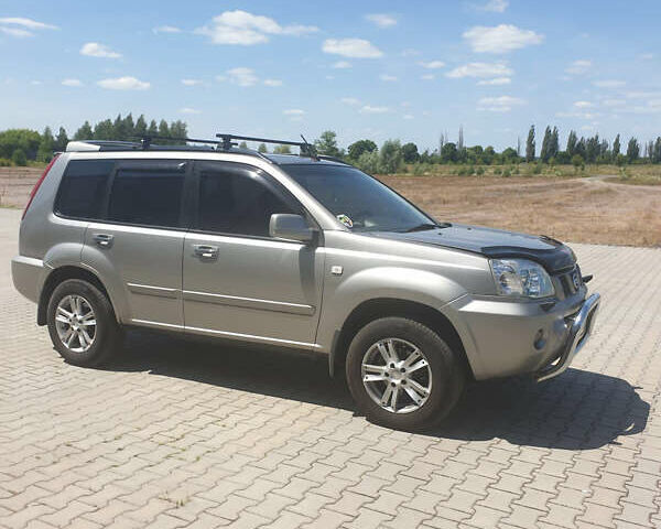 Сірий Ніссан ІксТрейл, об'ємом двигуна 2 л та пробігом 396 тис. км за 6499 $, фото 6 на Automoto.ua
