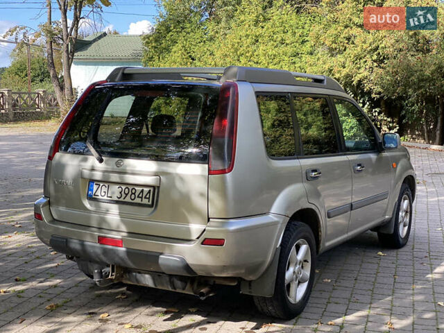 Сірий Ніссан ІксТрейл, об'ємом двигуна 2.2 л та пробігом 300 тис. км за 3350 $, фото 4 на Automoto.ua