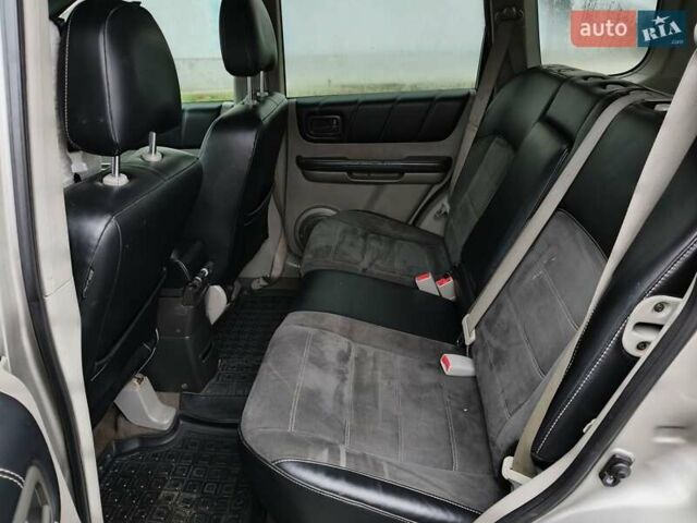 Серый Ниссан ИксТрейл, объемом двигателя 2 л и пробегом 270 тыс. км за 4196 $, фото 7 на Automoto.ua