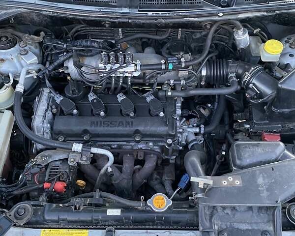 Серый Ниссан ИксТрейл, объемом двигателя 2.49 л и пробегом 261 тыс. км за 5700 $, фото 12 на Automoto.ua