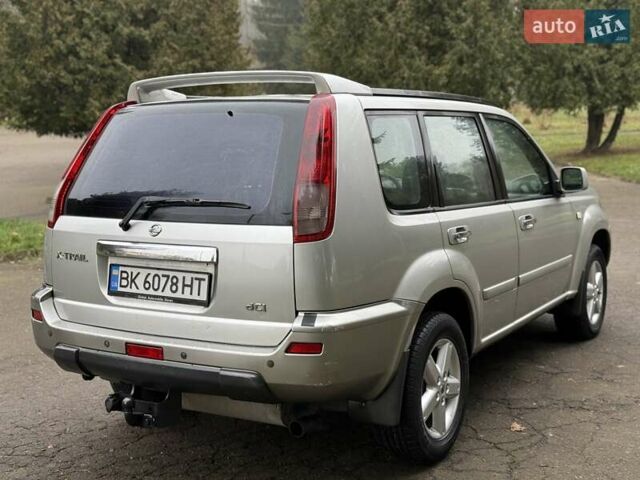 Серый Ниссан ИксТрейл, объемом двигателя 2.18 л и пробегом 280 тыс. км за 5850 $, фото 21 на Automoto.ua