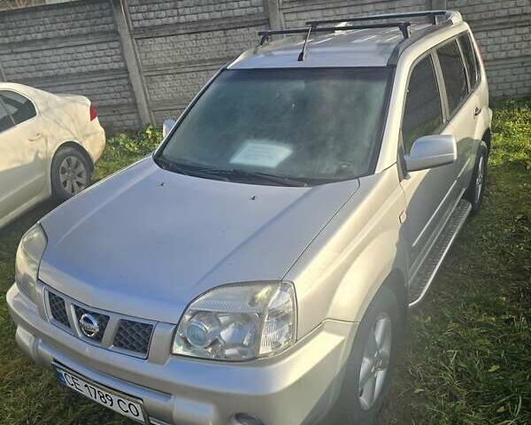 Серый Ниссан ИксТрейл, объемом двигателя 2.5 л и пробегом 240 тыс. км за 4750 $, фото 1 на Automoto.ua