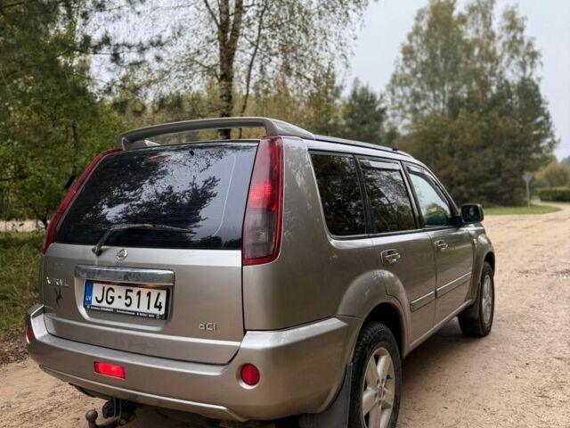 Сірий Ніссан ІксТрейл, об'ємом двигуна 2 л та пробігом 317 тис. км за 4000 $, фото 2 на Automoto.ua