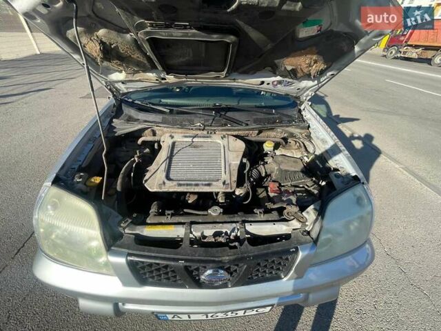 Серый Ниссан ИксТрейл, объемом двигателя 2.18 л и пробегом 405 тыс. км за 5500 $, фото 6 на Automoto.ua