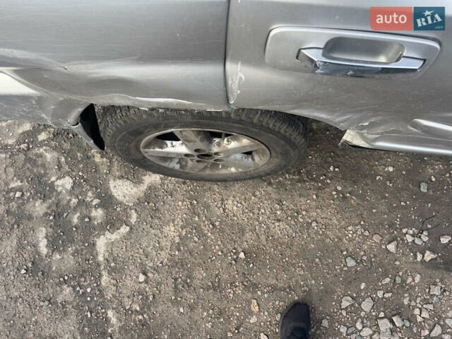 Серый Ниссан ИксТрейл, объемом двигателя 2.5 л и пробегом 250 тыс. км за 3899 $, фото 8 на Automoto.ua