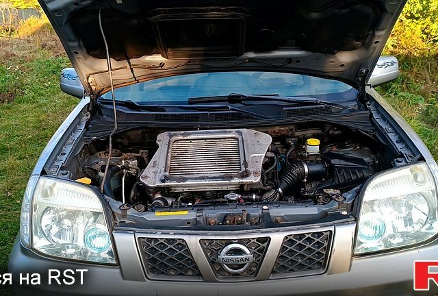 Серый Ниссан ИксТрейл, объемом двигателя 2.2 л и пробегом 350 тыс. км за 3550 $, фото 5 на Automoto.ua