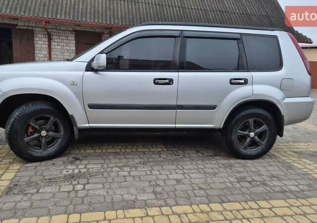 Серый Ниссан ИксТрейл, объемом двигателя 2.2 л и пробегом 490 тыс. км за 6000 $, фото 23 на Automoto.ua