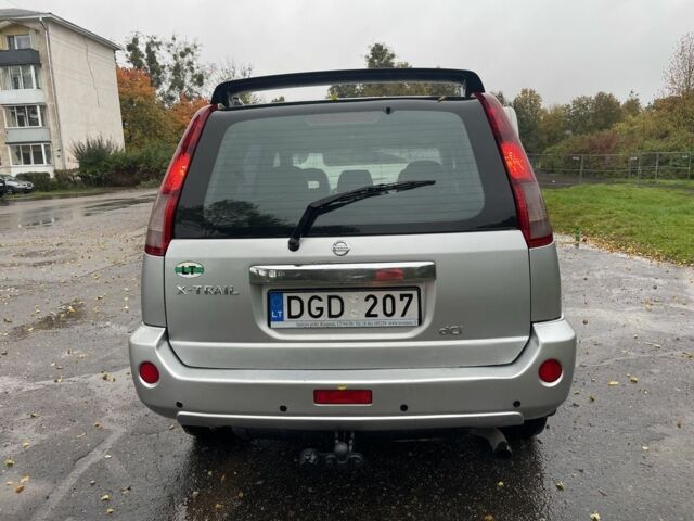 Серый Ниссан ИксТрейл, объемом двигателя 2.2 л и пробегом 287 тыс. км за 4750 $, фото 5 на Automoto.ua