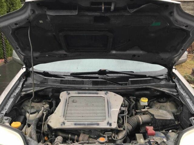 Серый Ниссан ИксТрейл, объемом двигателя 2.2 л и пробегом 188 тыс. км за 3850 $, фото 23 на Automoto.ua