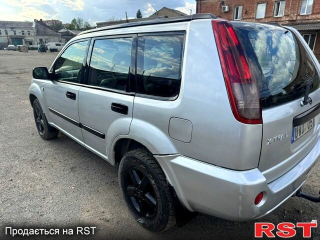 Сірий Ніссан ІксТрейл, об'ємом двигуна 2.2 л та пробігом 251 тис. км за 3600 $, фото 1 на Automoto.ua