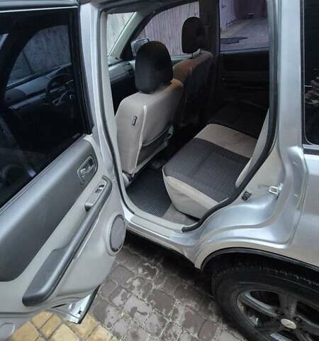 Серый Ниссан ИксТрейл, объемом двигателя 2.2 л и пробегом 490 тыс. км за 6000 $, фото 10 на Automoto.ua