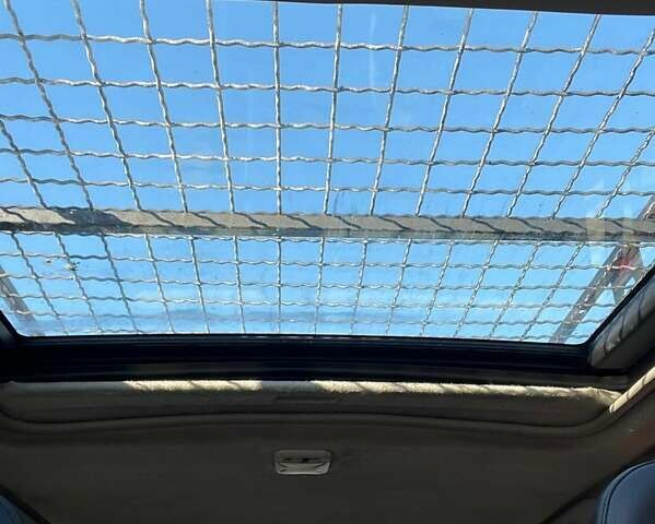 Серый Ниссан ИксТрейл, объемом двигателя 2.18 л и пробегом 405 тыс. км за 5500 $, фото 8 на Automoto.ua