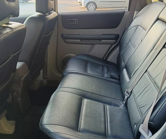 Серый Ниссан ИксТрейл, объемом двигателя 2 л и пробегом 312 тыс. км за 7200 $, фото 7 на Automoto.ua