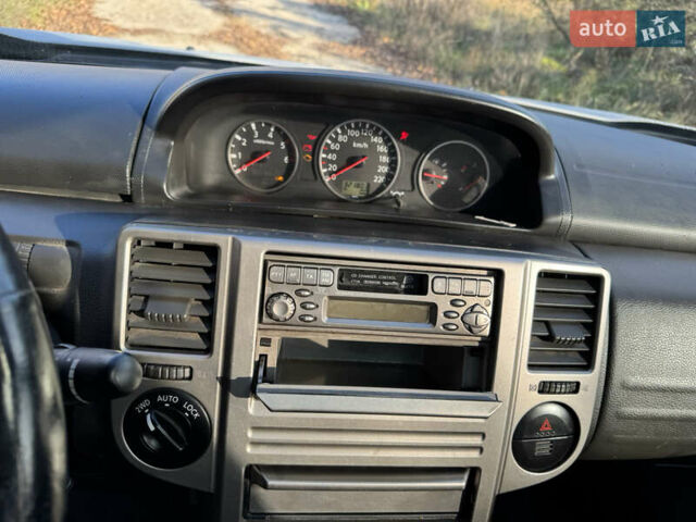 Серый Ниссан ИксТрейл, объемом двигателя 2.18 л и пробегом 320 тыс. км за 4900 $, фото 9 на Automoto.ua