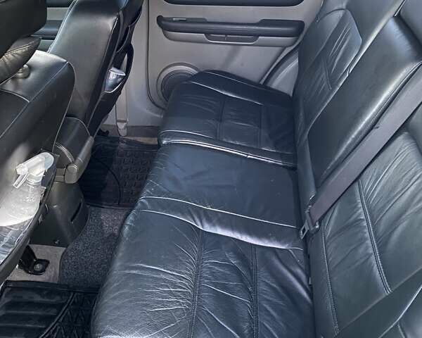 Серый Ниссан ИксТрейл, объемом двигателя 2.49 л и пробегом 261 тыс. км за 5700 $, фото 8 на Automoto.ua