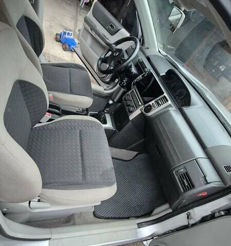 Серый Ниссан ИксТрейл, объемом двигателя 2.2 л и пробегом 490 тыс. км за 6000 $, фото 4 на Automoto.ua