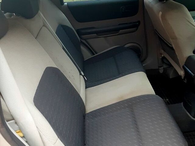 Серый Ниссан ИксТрейл, объемом двигателя 2 л и пробегом 210 тыс. км за 4500 $, фото 9 на Automoto.ua