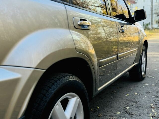 Серый Ниссан ИксТрейл, объемом двигателя 2.2 л и пробегом 238 тыс. км за 4250 $, фото 6 на Automoto.ua